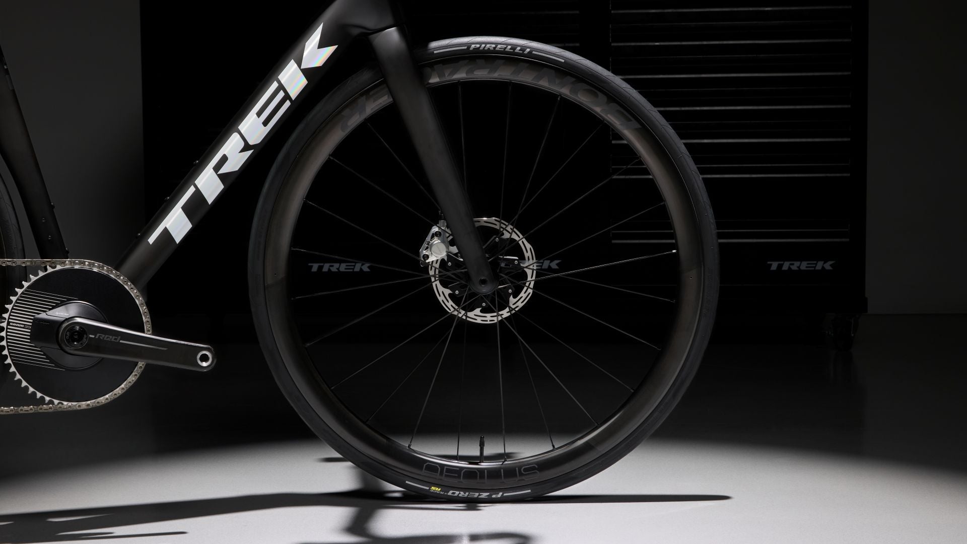 Close-up of a Trek bicycle wheel with a black and white color scheme.