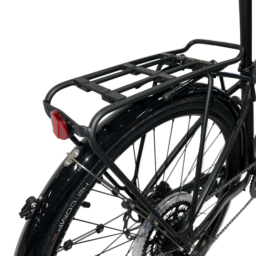 Black bicycle with a rear rack and fenders on a white background